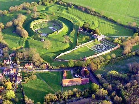 An aerial view of the Basing House ruins, earthworks and walled garden